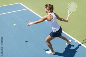 Young woman playing tennis